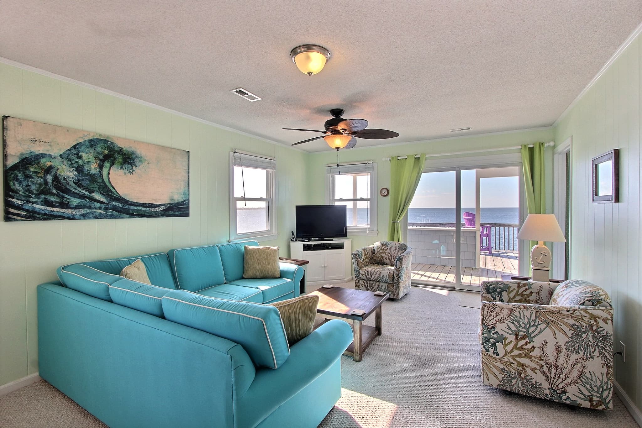 Living room with sound view through sliding door